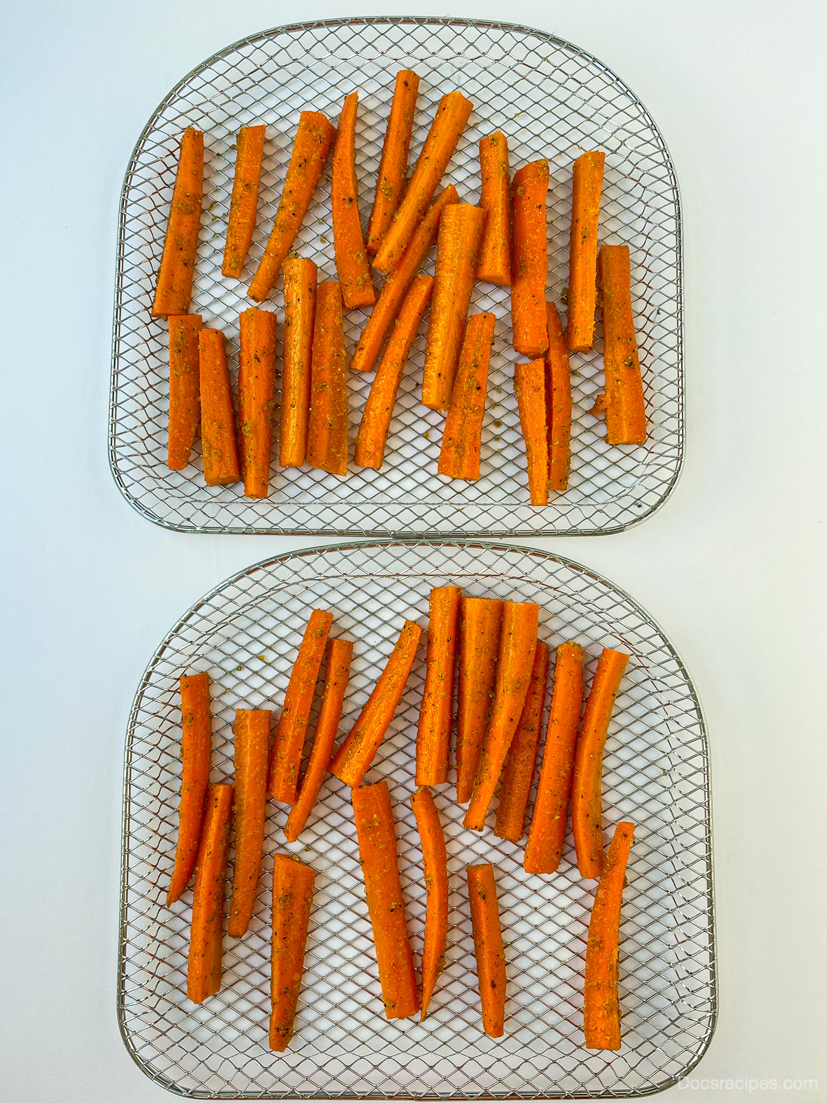 Overhead image of Air Fryer Carrot Fries on cooking sheet 