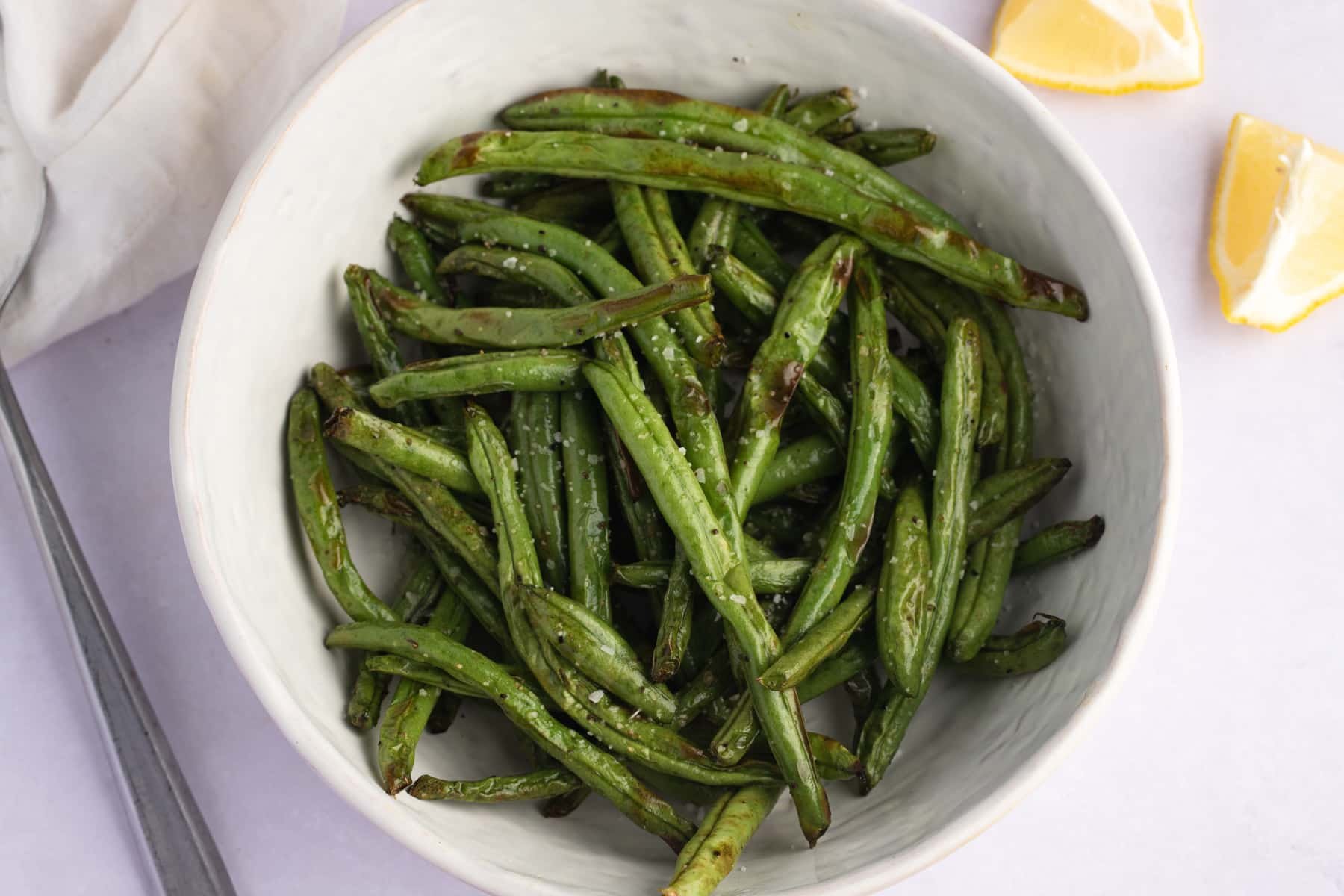 cooked side dish in a white serving bowl