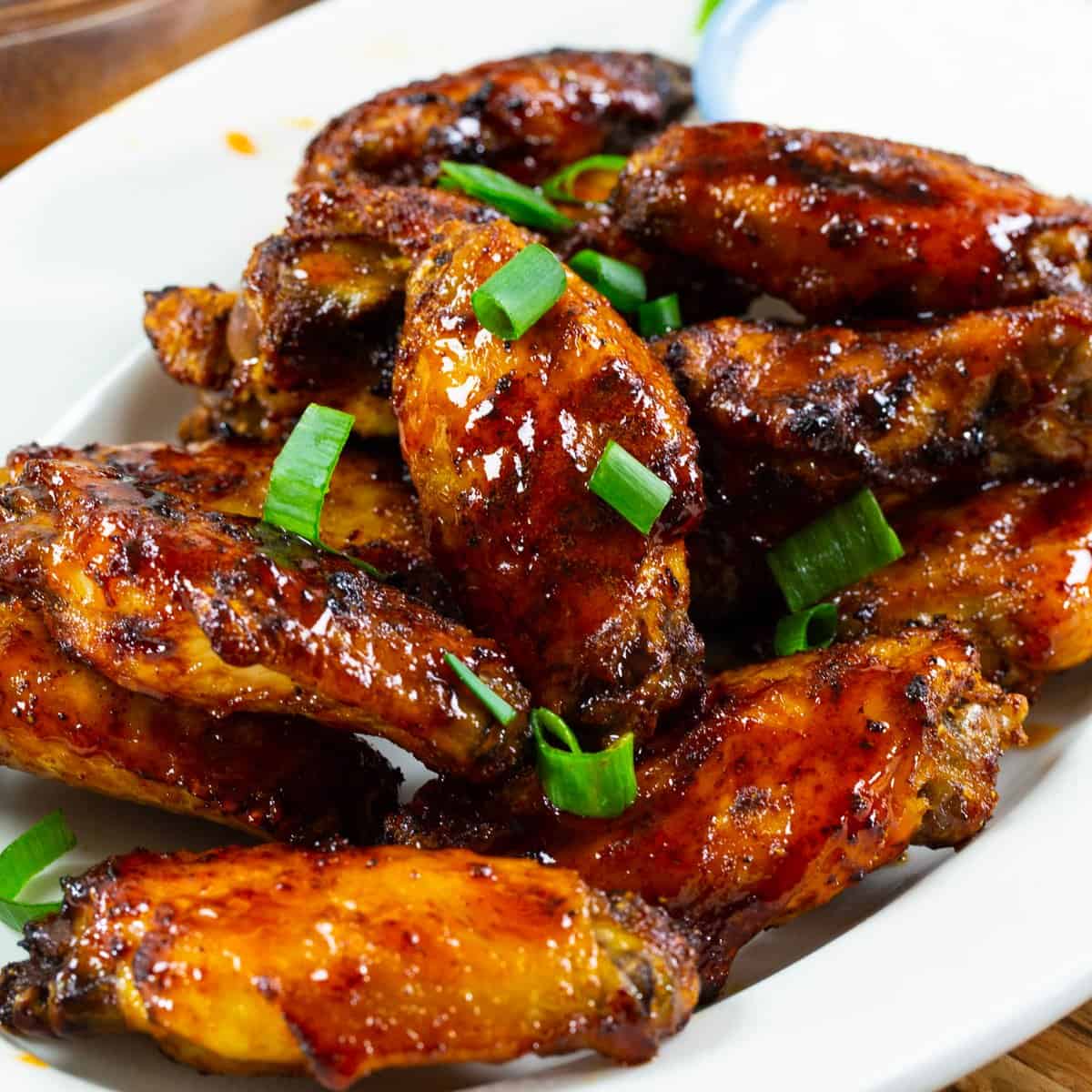 Air Fryer Honey Sriracha Wings on a plate.