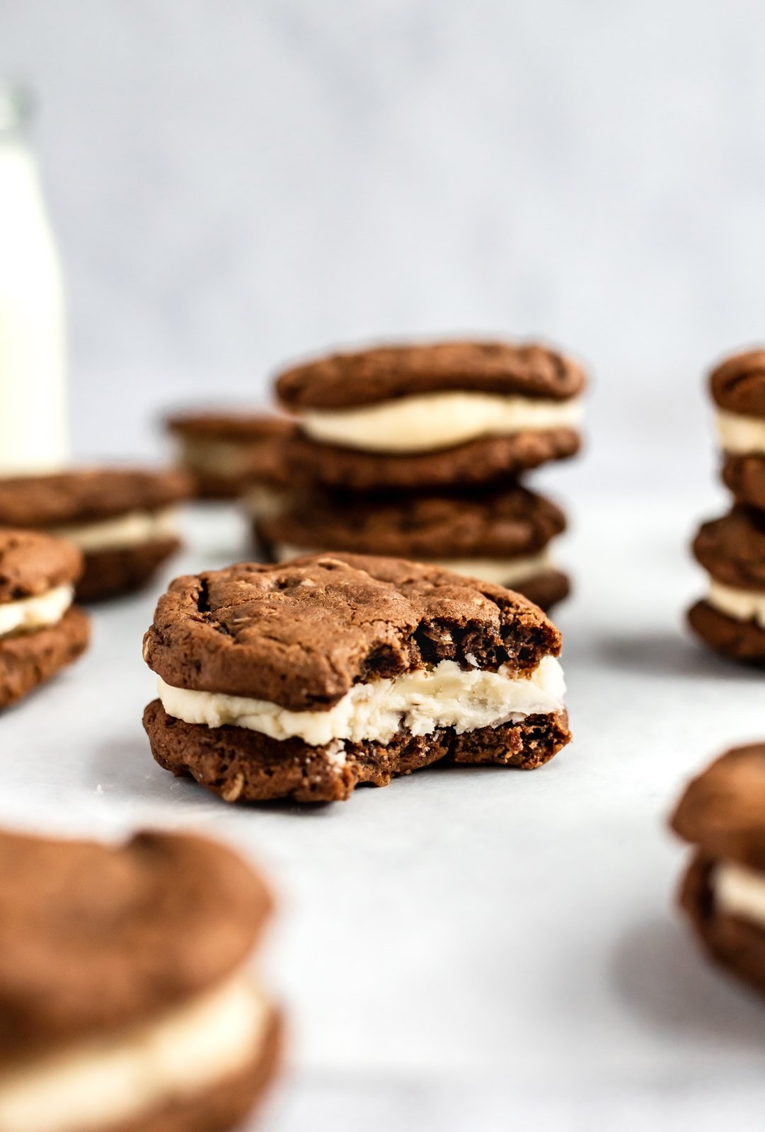 gingerbread oatmeal cream pie with a bite taken out