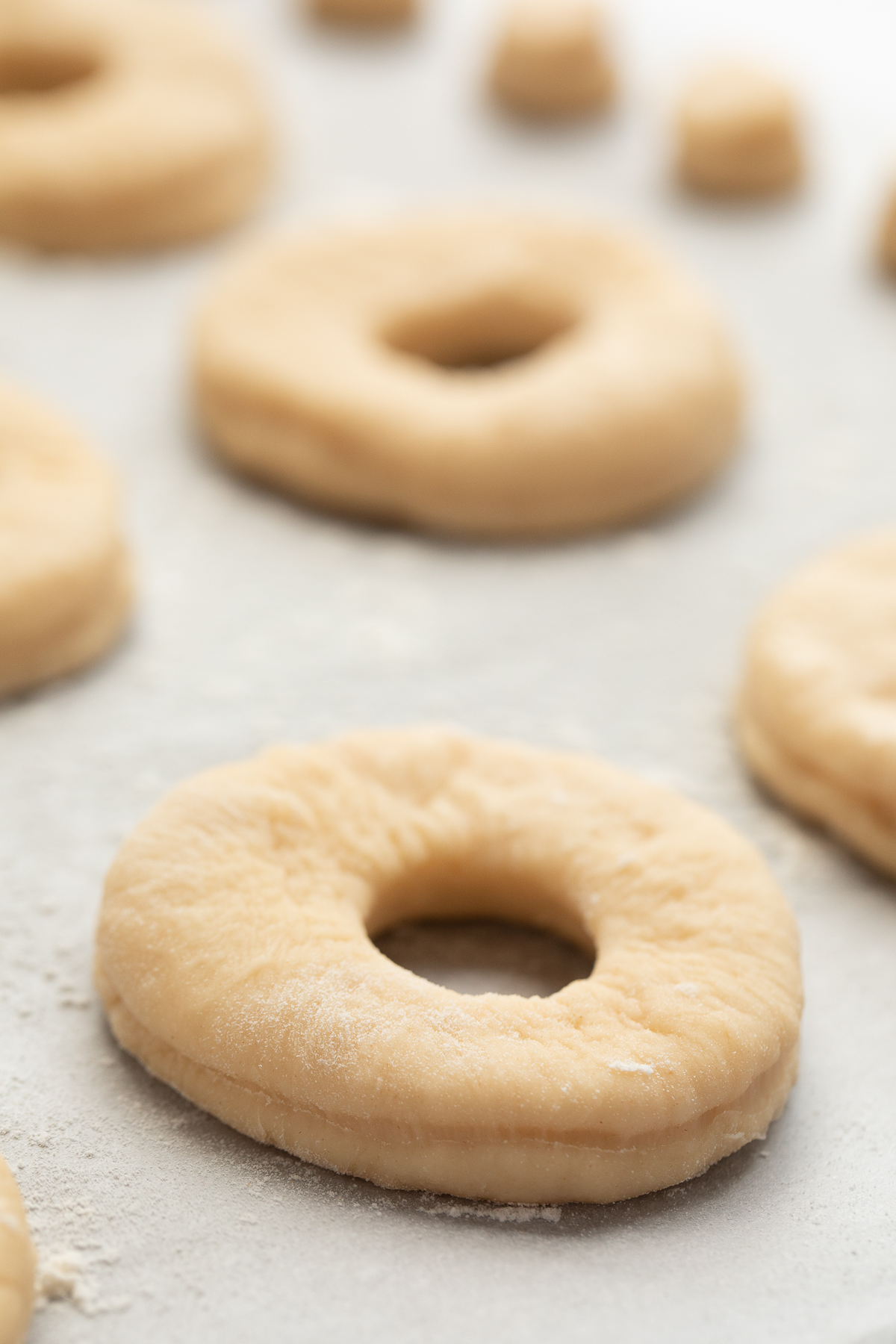 dough cut into donuts