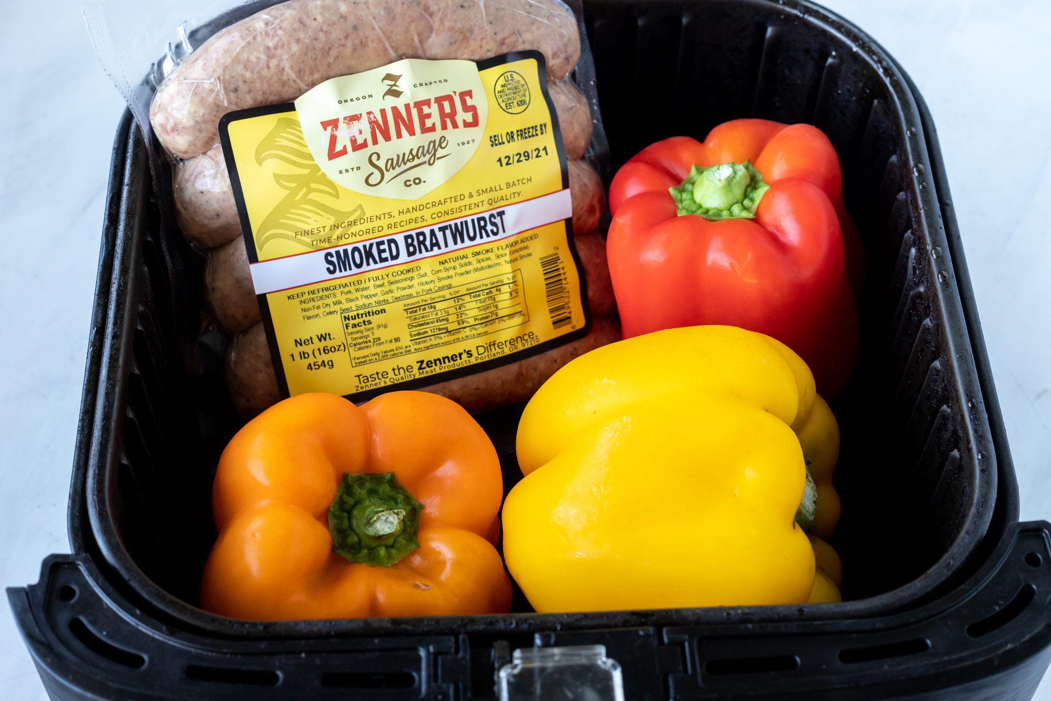 non prepped brats and peppers in air fryer basket