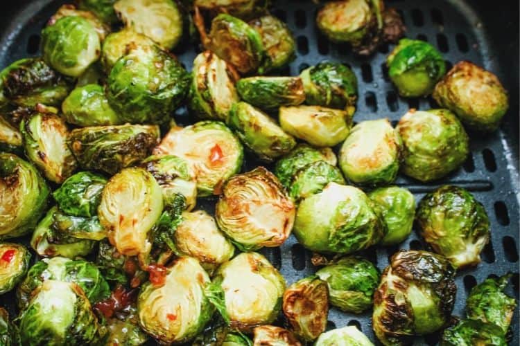 Sweet Chili on Brussels Sprouts inside air fryer
