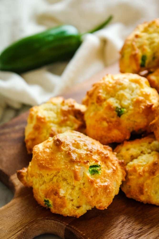 Air Fryer Hush Puppies on brown cutting board