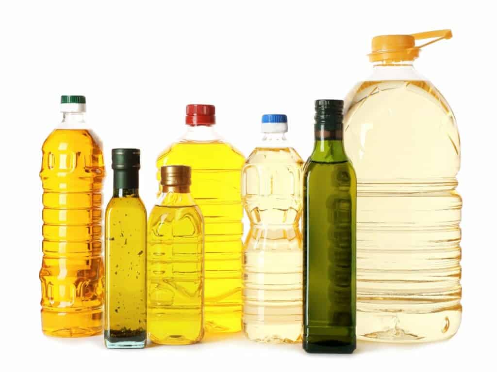 Bottles of different kinds of cooking oil in packaging