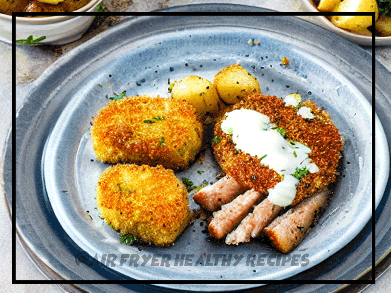Air fryer herby crumbed fish with aioli and accordion potatoes